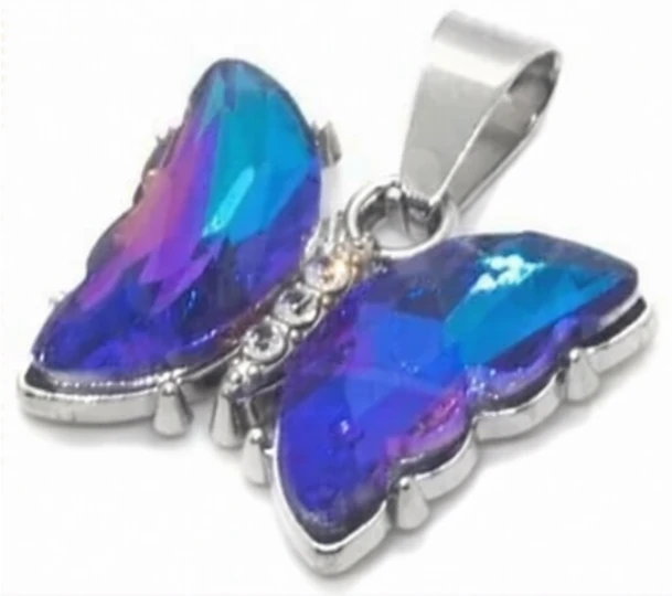 Dije de acero quirurgico mariposa con cubic azul tornasol 22mm